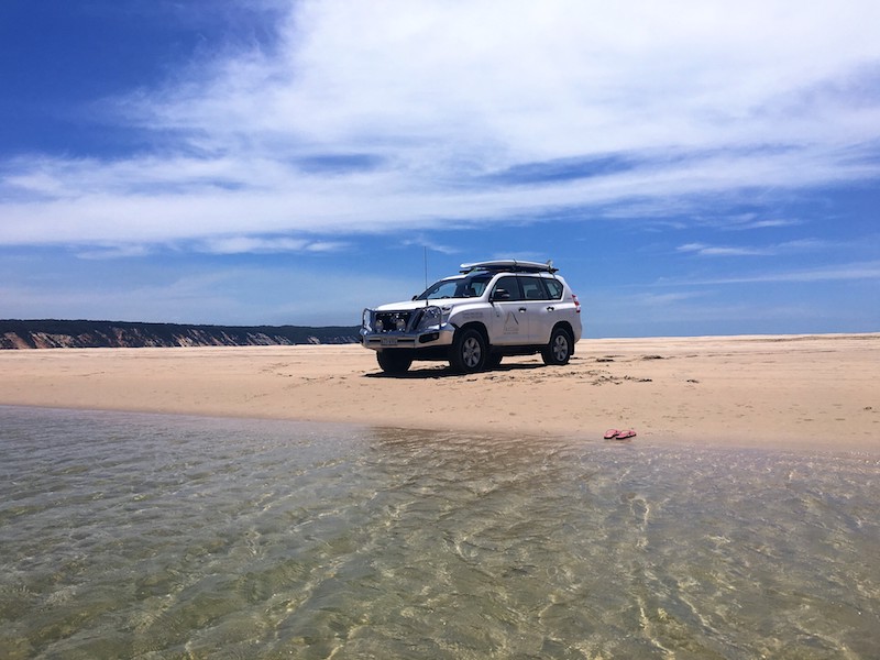 Toyota LandCruiser on beach of Double Island Point