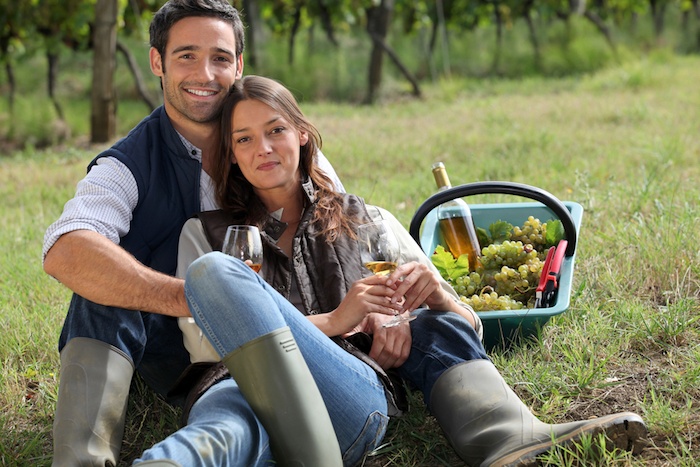 Romantic getaway - couple with picnic basket
