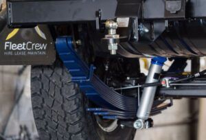 Blue Lovells GVM upgraded suspension components on the underside of a 4WD vehicle