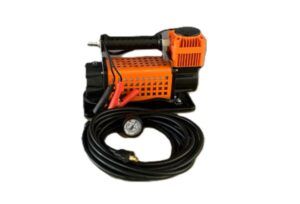 Orange tyre compressor with jumper leads and pressure gauge