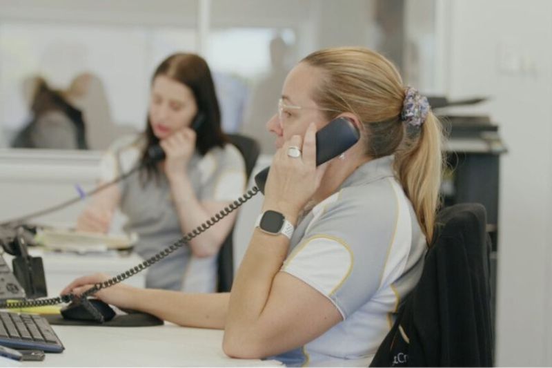FleetCrew staff members on the phone