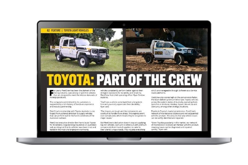 A laptop with the screen displaying a website article about FleetCrew, there are 4wd vehicles in the banner