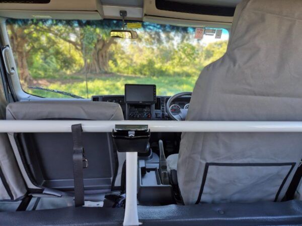 Looking through to the front of the cab from the rear seats of Isuzu mine spec 4wd truck