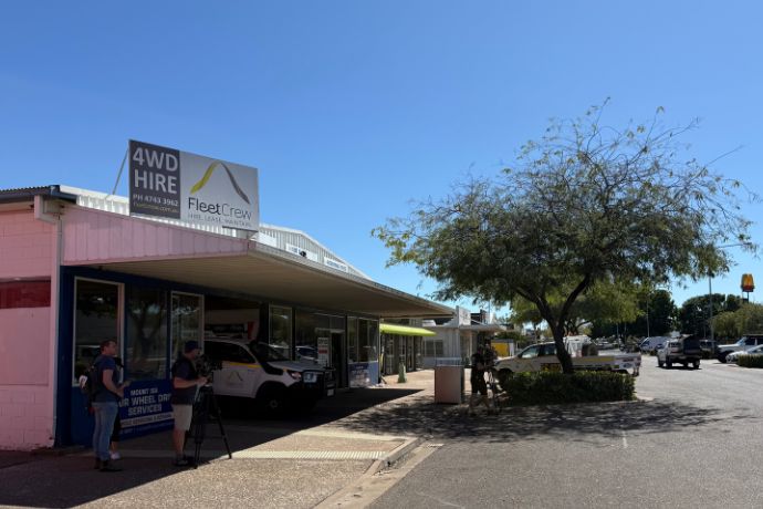 A film crew out side of the FleetCrew branch in Mount Isa
