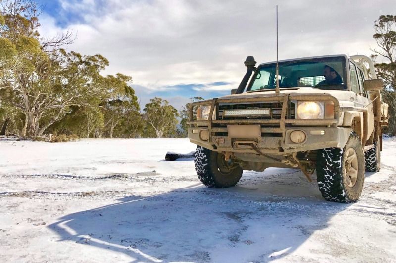 A LandCruiser 70 Series working in the Snow
