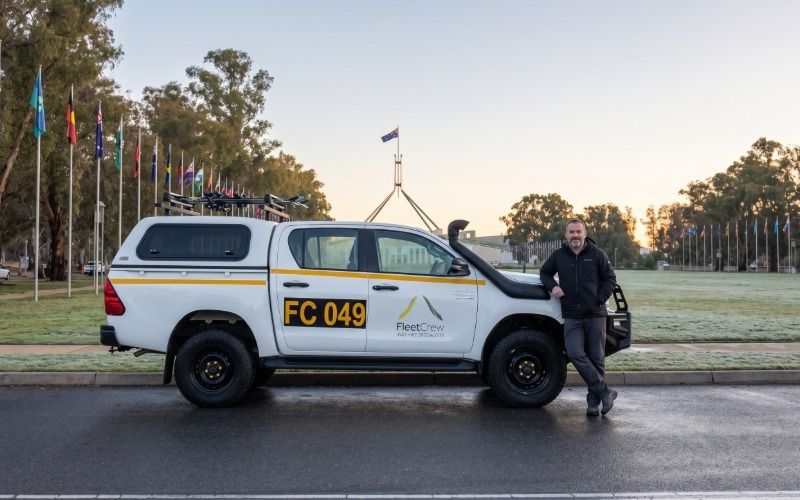 FleetCrew Hilux at Parliament House on a cold Canberra morning